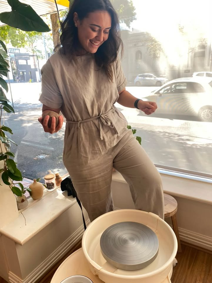 Louisa at the pottery wheel